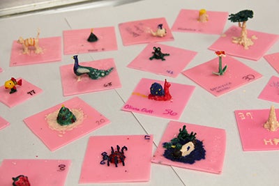 Group of tiny wax sculptures