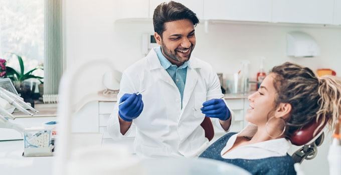 Dentist with patient